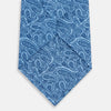 View 3 of product The Blue Paisley Silk Tie by Turnbull & Asser is crafted from fine English silk and features an intricate blue paisley pattern on a crisp white background—an elegant choice for any formal occasion.