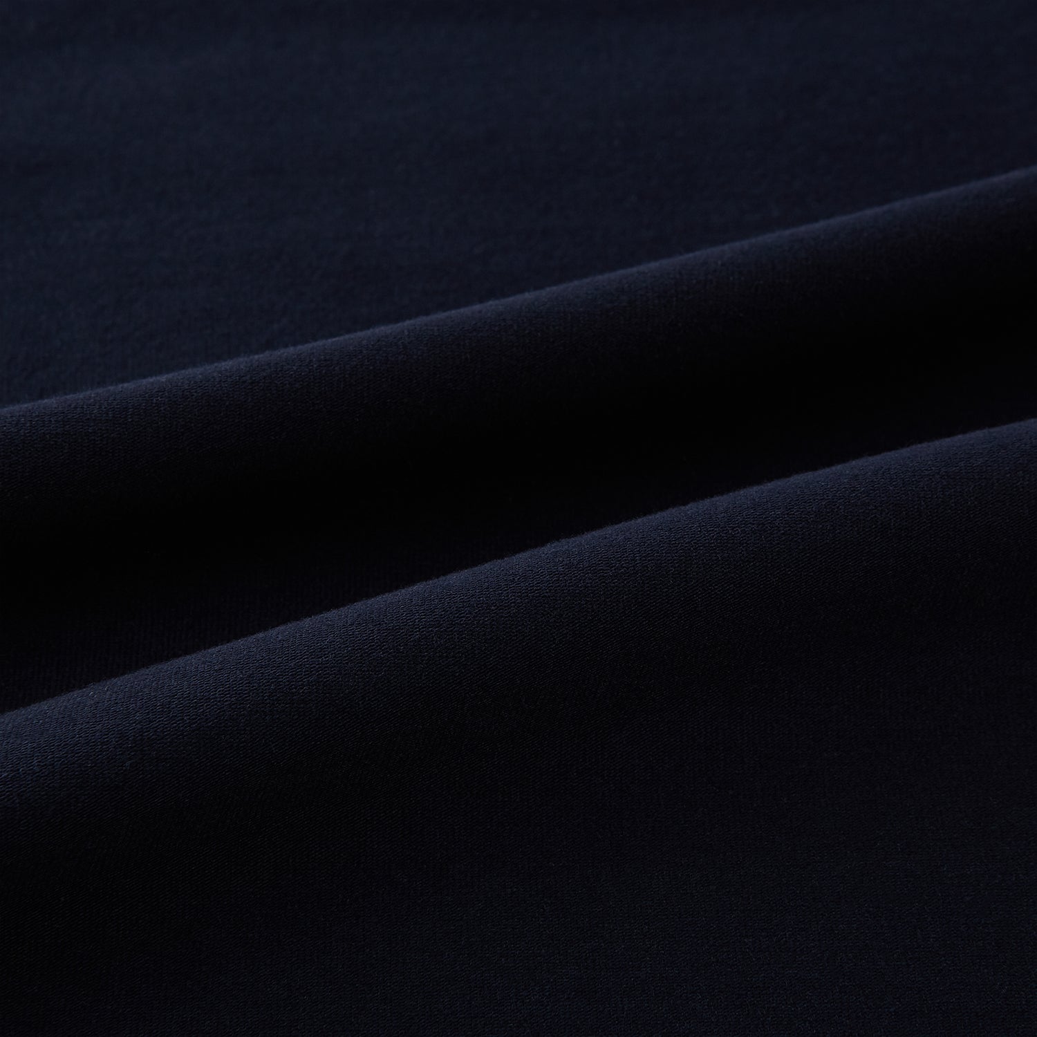 View 6 of product A navy short-sleeve pyjama shirt by Turnbull & Asser is laid flat on a white background, displaying the front view. Its soft fabric ensures comfort with no visible logos, designs, or patterns on the shirt.