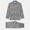 View 1 of product The Turnbull & Asser Pale Blue Baroque Silk-blend Hyde Pyjama Set features a long-sleeve button-up shirt and pants in a blue and beige paisley pattern, shown flat on a white background.