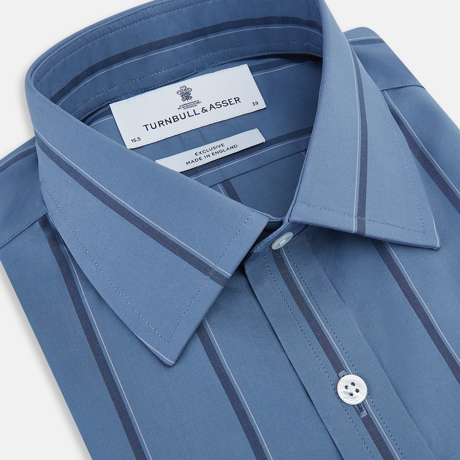View 2 of product The Turnbull & Asser Steel Grey and Navy Track Stripe Mayfair Shirt features long sleeves, a collar, white buttons, and a relaxed fit, shown on a plain white background.