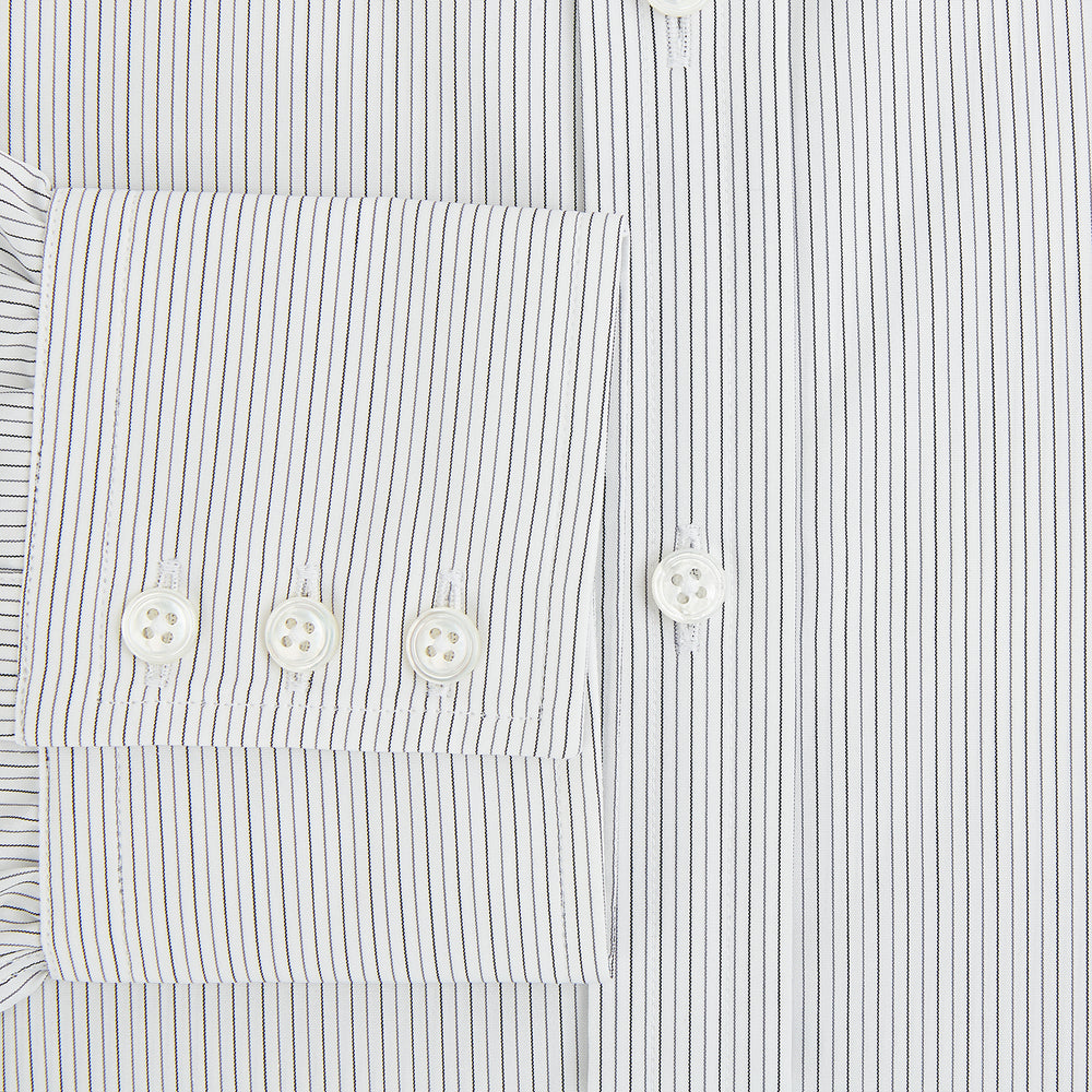 The Turnbull & Asser Midnight Blue and Grey Fine Stripe Mayfair Shirt features long sleeves, pure cotton fabric, a pointed collar, button-down front, and buttoned cuffs—ideal for formal wear.