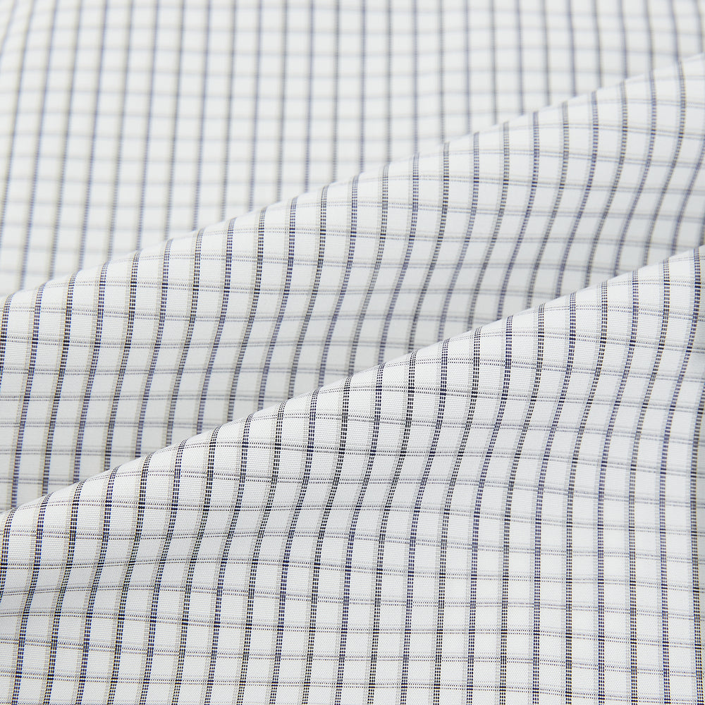 The Midnight Blue Multi Check Mayfair Shirt by Turnbull & Asser is a pure cotton, long-sleeve button-down featuring a small blue multi-check pattern, pointed collar, and buttoned cuffs.