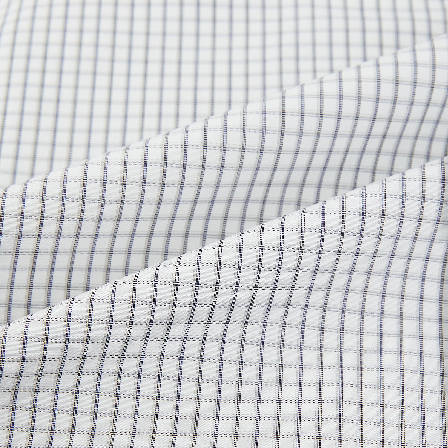 View 6 of product The Midnight Blue Multi Check Mayfair Shirt by Turnbull & Asser is a pure cotton, long-sleeve button-down featuring a small blue multi-check pattern, pointed collar, and buttoned cuffs.