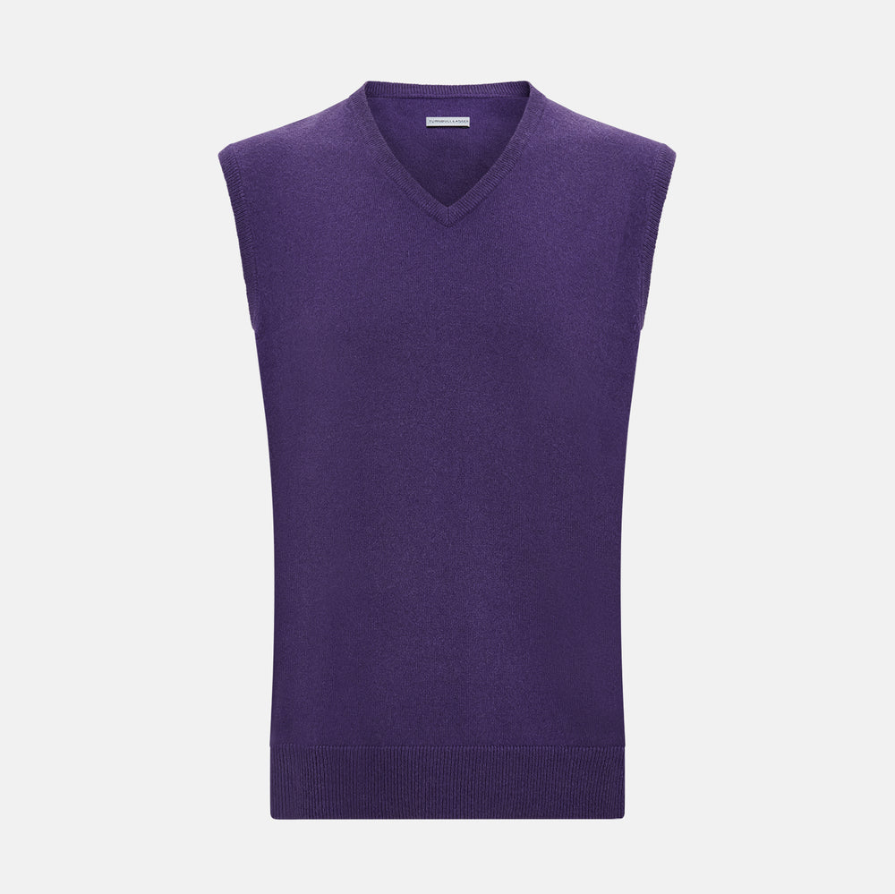 The Turnbull & Asser Purple Cashmere V-Neck Vest for men is shown against a white background. Featuring a ribbed hem and clean lines, this sleeveless jumper is ideal for layering in cooler weather.