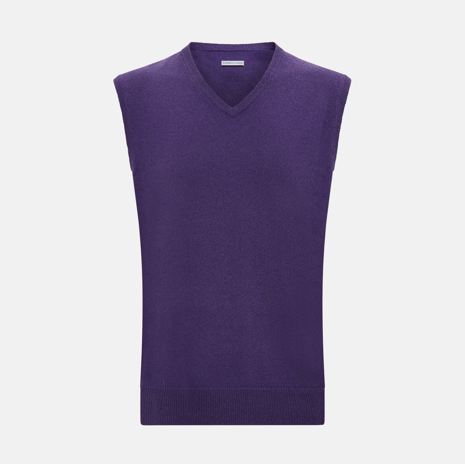 View 1 of product The Turnbull & Asser Purple Cashmere V-Neck Vest for men is shown against a white background. Featuring a ribbed hem and clean lines, this sleeveless jumper is ideal for layering in cooler weather.