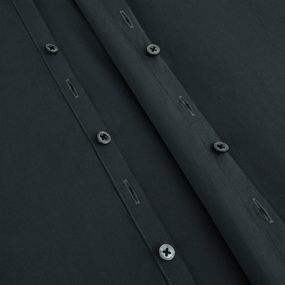 The Charcoal Windsor Shirt by Turnbull & Asser is a black, long-sleeve button-up with a pointed Windsor collar, buttoned cuffs, and a straight hem, shown flat on a white background.