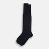 View 2 of product A single Turnbull & Asser Navy Micro Knit Long Sock is shown in a side profile against a plain white background, with the toe pointing downward and the cuff at the top.