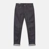 View 1 of product A pair of Turnbull & Asser Indigo Japanese Selvedge Denim Jeans in dark blue with rolled-up cuffs, yellow stitching, five pockets, and a button fly, laid flat on a white background.