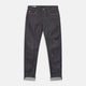 A pair of Turnbull & Asser Indigo Japanese Selvedge Denim Jeans in dark blue with rolled-up cuffs, yellow stitching, five pockets, and a button fly, laid flat on a white background.