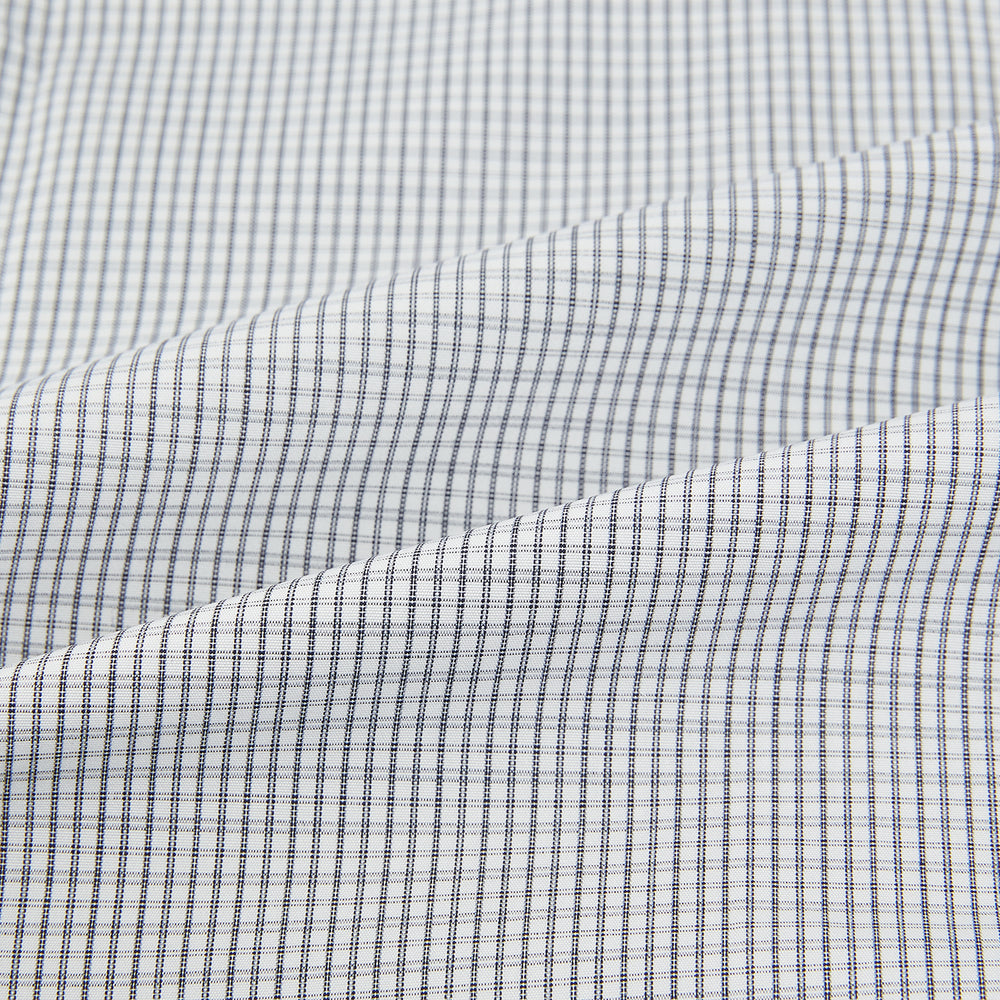 The Midnight Blue Micro Tattersall Check Mayfair Shirt by Turnbull & Asser, made from pure cotton with white buttons, a classic collar, and cuffed sleeves, is laid flat on a white background.