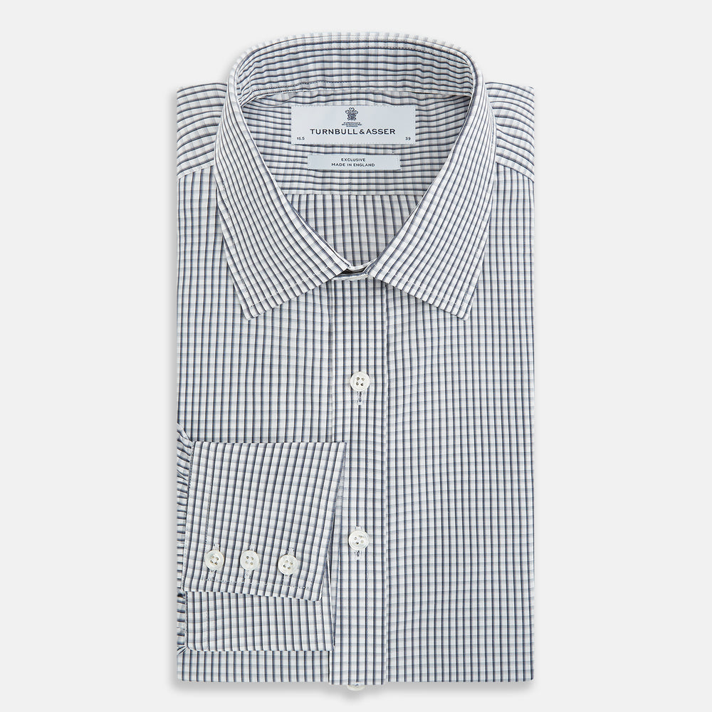 The Grey Double Graph Mayfair Shirt by Turnbull & Asser is a long-sleeve, button-down cotton shirt with a black and white double graph check, chest pocket, and classic collar.