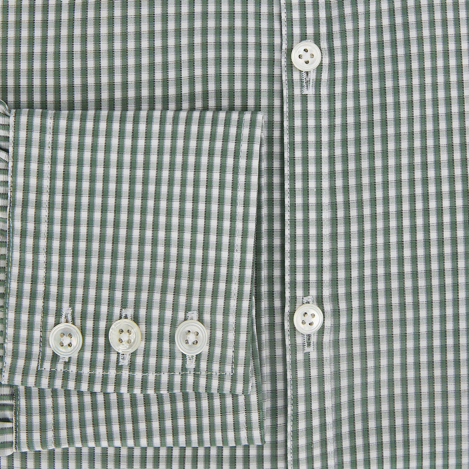 View 4 of product The MELON GREEN MICRO SHADOW CHECK WESTMINSTER SHIRT by Turnbull & Asser is a long-sleeved, button-up shirt with a green and white checkered pattern, pointed collar, and buttoned cuffs, shown on a white background.