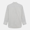 View 5 of product A Grey Fine Check Cotton Blend Weekend Fit Suffolk Shirt by Turnbull & Asser with long sleeves, a collar, and single chest pocket is laid flat on a white background.