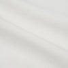 View 5 of product The Turnbull & Asser Cream Silk Tailored Fit Shirt is a long-sleeve button-up with a pointed collar and buttoned cuffs, displayed laid flat against a plain white background.