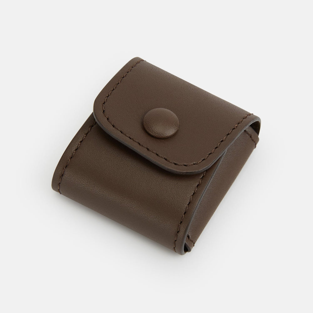 Turnbull & Asser’s Dark Chocolate Leather Cufflinks feature square Italian leather with stitched edges and braided links, perfect for men’s accessories, shown here on a white background.