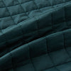 View 4 of product The Turnbull & Asser Forest Green Double-Breasted Quilted Gilet features black buttons, a chest pocket, two zippered side pockets, and an overlapping collar—ideal for layered dressing against a plain white background.