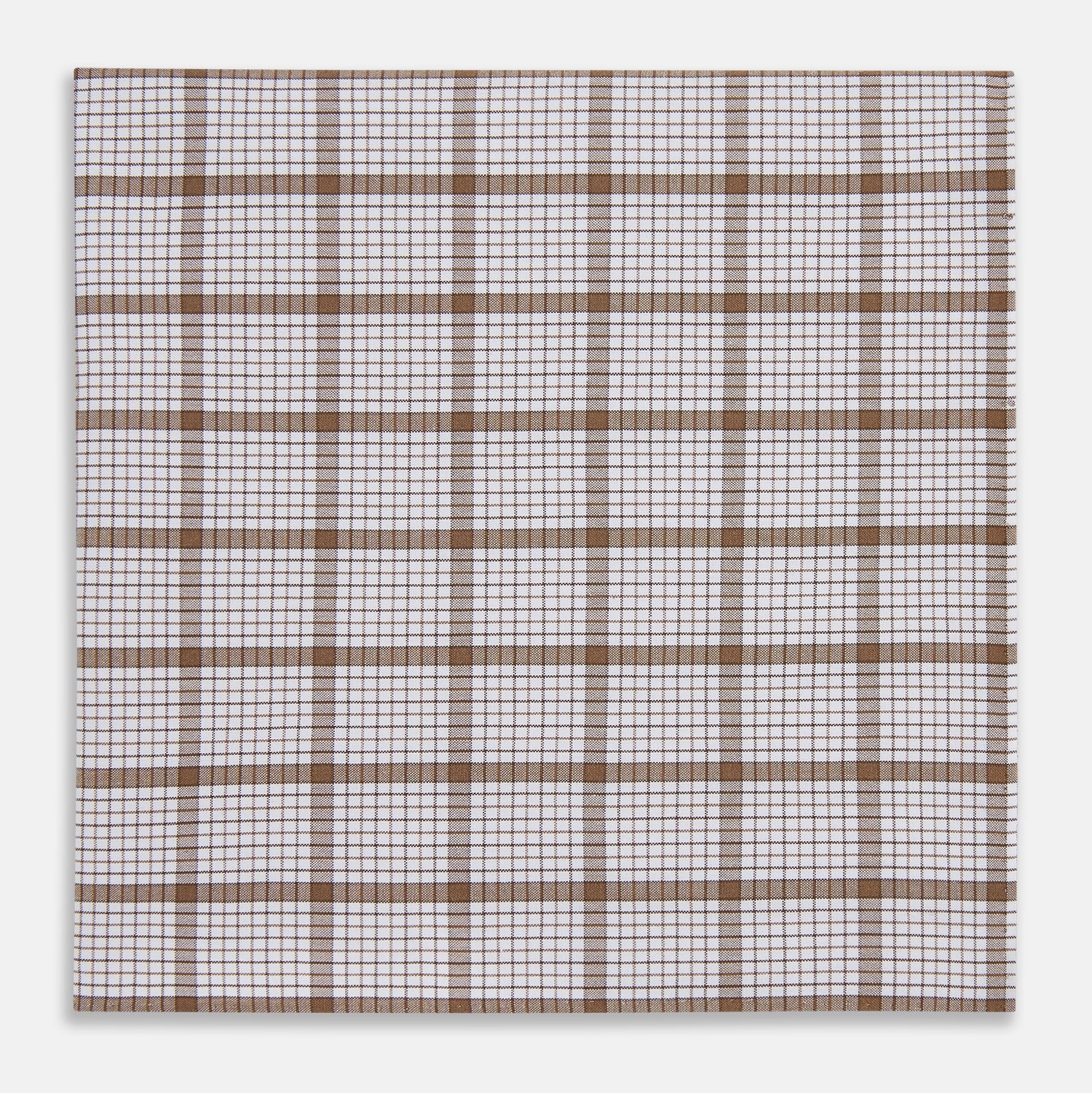 View 1 of product The Turnbull & Asser Hand Rolled Brown Overlay Check Handkerchief is a rectangular white cotton accessory with evenly spaced brown and black grid lines, forming squares—a timeless classic for gentlemen.