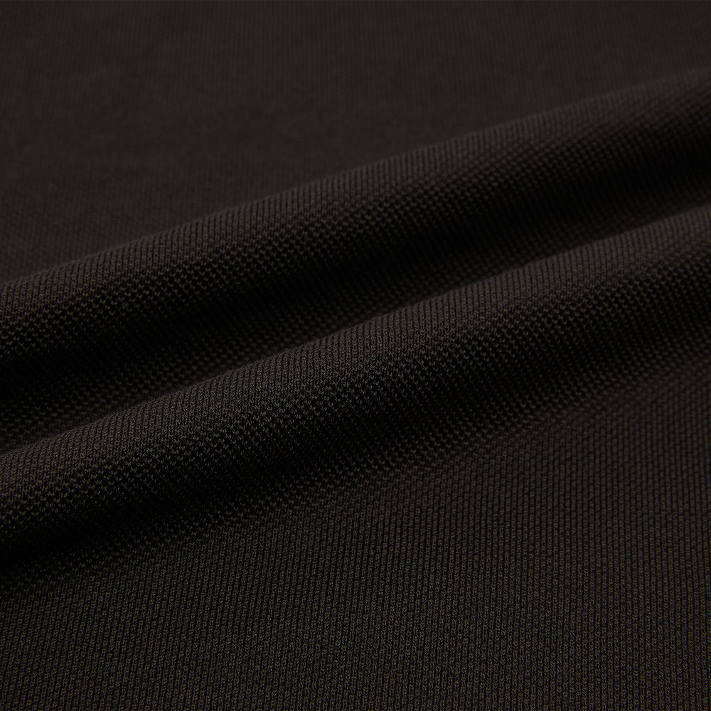 A brown Rugby Polo Shirt by Turnbull & Asser, made of pure cotton with long sleeves, a collar, and a short buttonless placket, is laid flat on a white background.