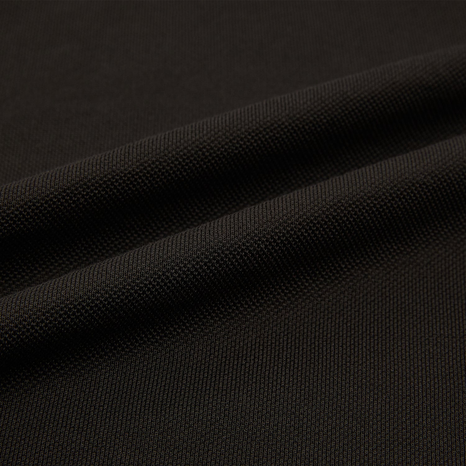 View 6 of product A brown Rugby Polo Shirt by Turnbull & Asser, made of pure cotton with long sleeves, a collar, and a short buttonless placket, is laid flat on a white background.