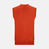 View 3 of product The Turnbull & Asser Red Orange Cashmere Sleeveless Cardigan features a ribbed collar, hem, and armholes, button-down front, and two front pockets—perfect as a refined light layer, shown against a white background.