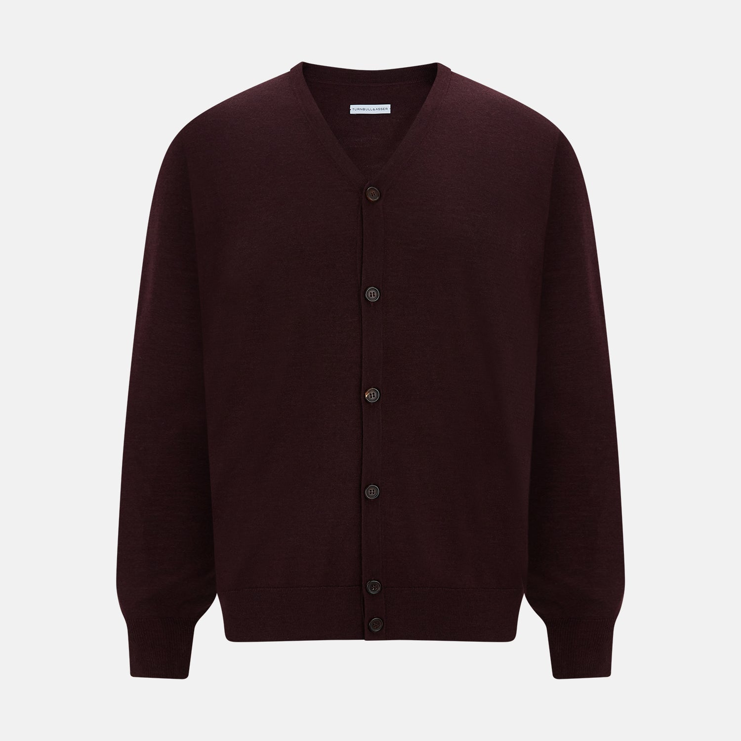 View 1 of product The Turnbull & Asser Burgundy Fine Merino V-Neck Cardigan features long sleeves and a button-down front, highlighting elegant handcrafted knitwear against a plain white background.
