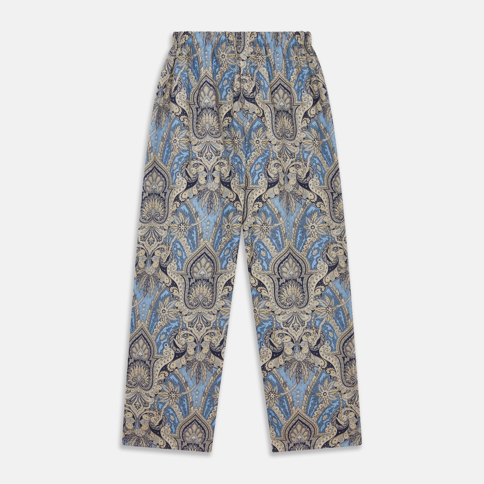 View 5 of product The Turnbull & Asser Pale Blue Baroque Silk-blend Hyde Pyjama Set features a long-sleeve button-up shirt and pants in a blue and beige paisley pattern, shown flat on a white background.