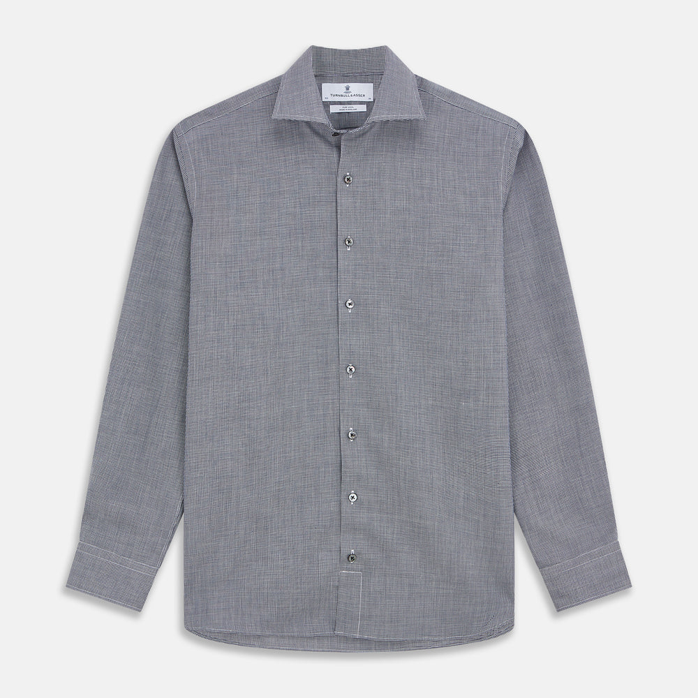 The Turnbull & Asser Navy Houndstooth Wool Tailored Fit Shelton Shirt features a classic collar, buttoned cuffs, and a refined tailored fit, shown laid flat on a white background.
