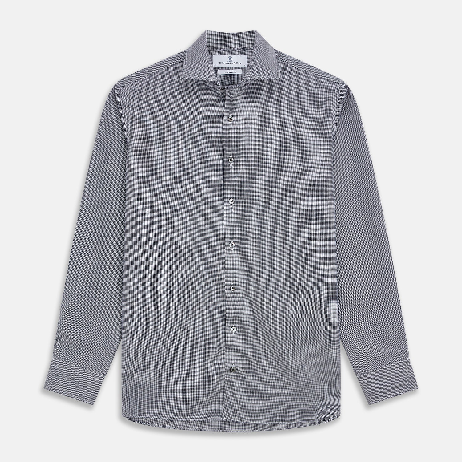 View 1 of product The Turnbull & Asser Navy Houndstooth Wool Tailored Fit Shelton Shirt features a classic collar, buttoned cuffs, and a refined tailored fit, shown laid flat on a white background.