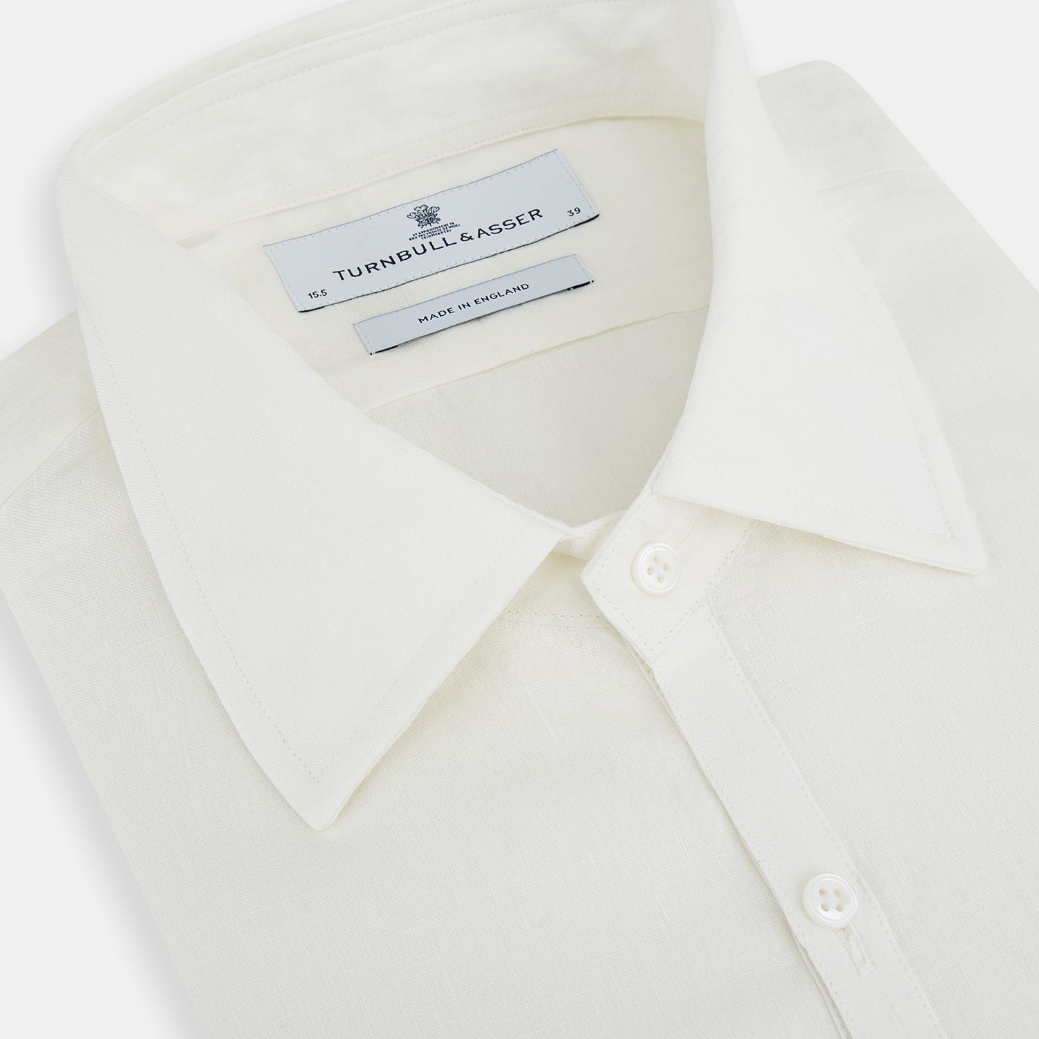 View 2 of product The Vanilla Linen Westminster Shirt by Turnbull & Asser is a long-sleeve, white button-up with a Turnbull collar, buttoned cuffs, and straight hem, highlighting British craftsmanship against a plain white background.