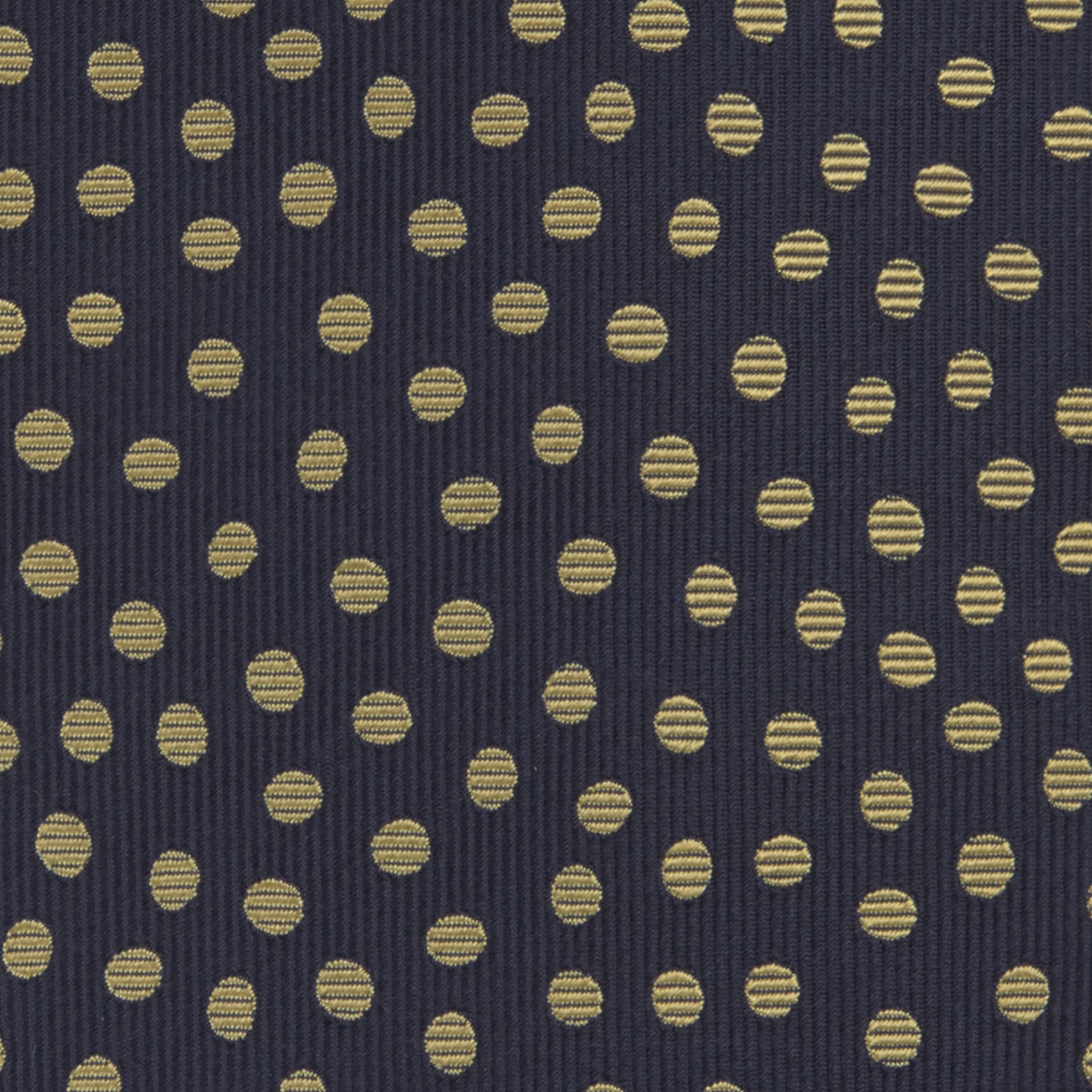 View 3 of product The Turnbull & Asser Navy and Gold Paint Spot Silk Tie features evenly spaced gold spots on classic navy silk, rolled and displayed on a plain white background—ideal for complementing your favorite office shirt.