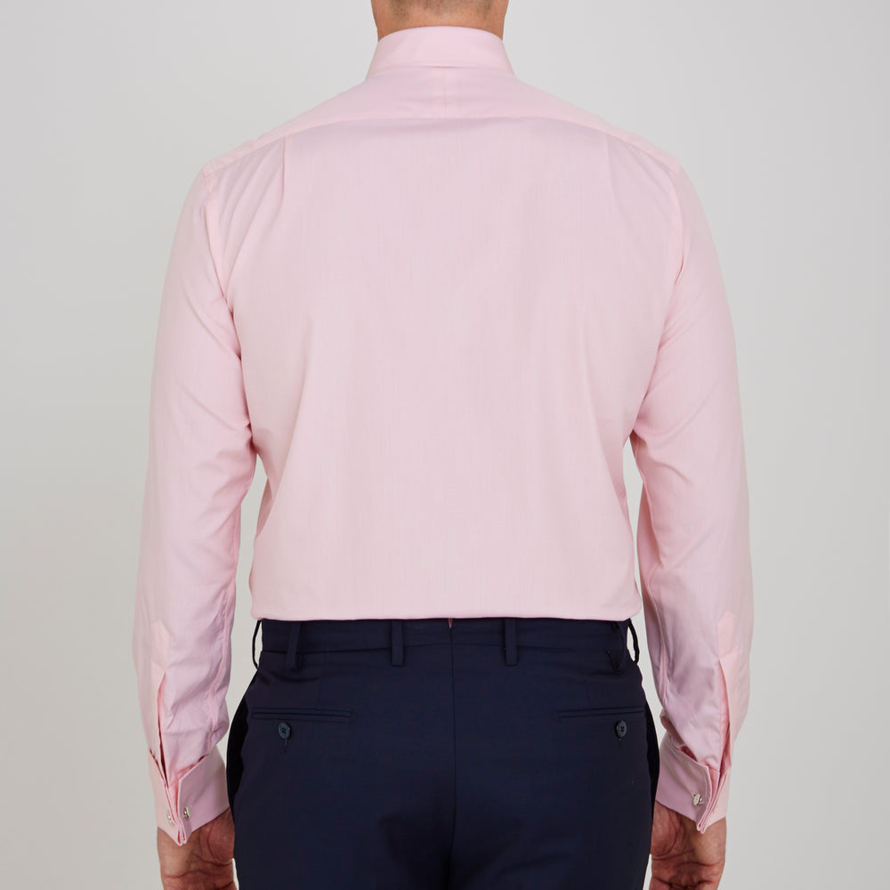 The Pink End-on-End Shirt with T&A Collar and Double Cuffs by Turnbull & Asser, shown neatly folded on a white background, updates timeless elegance with its classic detailing and refined pink hue.