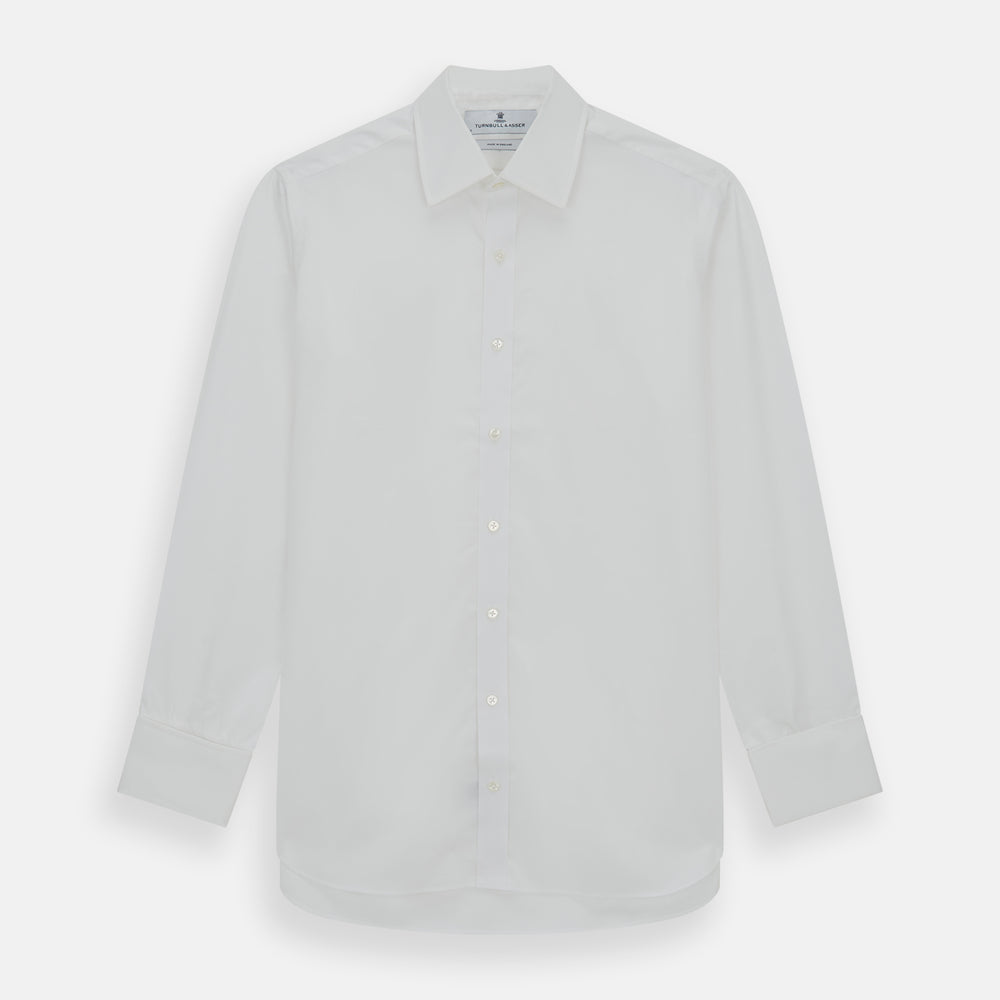 The Turnbull & Asser Plain White Cotton Shirt features a T&A collar and double cuffs, shown flat on a white background—ideal for pairing with standout ties or achieving a minimalist look.