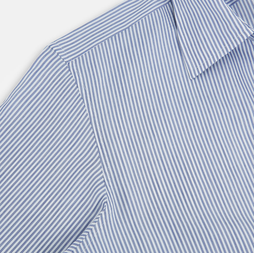 The Turnbull & Asser Navy and White Stripe Westminster Shirt features thin vertical stripes, a Turnbull collar, long sleeves, and classic British craftsmanship, shown flat on a white background.