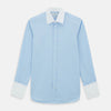 View 1 of product The Turnbull & Asser Light Blue End-on-End Shirt features a crisp white T&A contrast collar and double cuffs, shown flat on a white background.