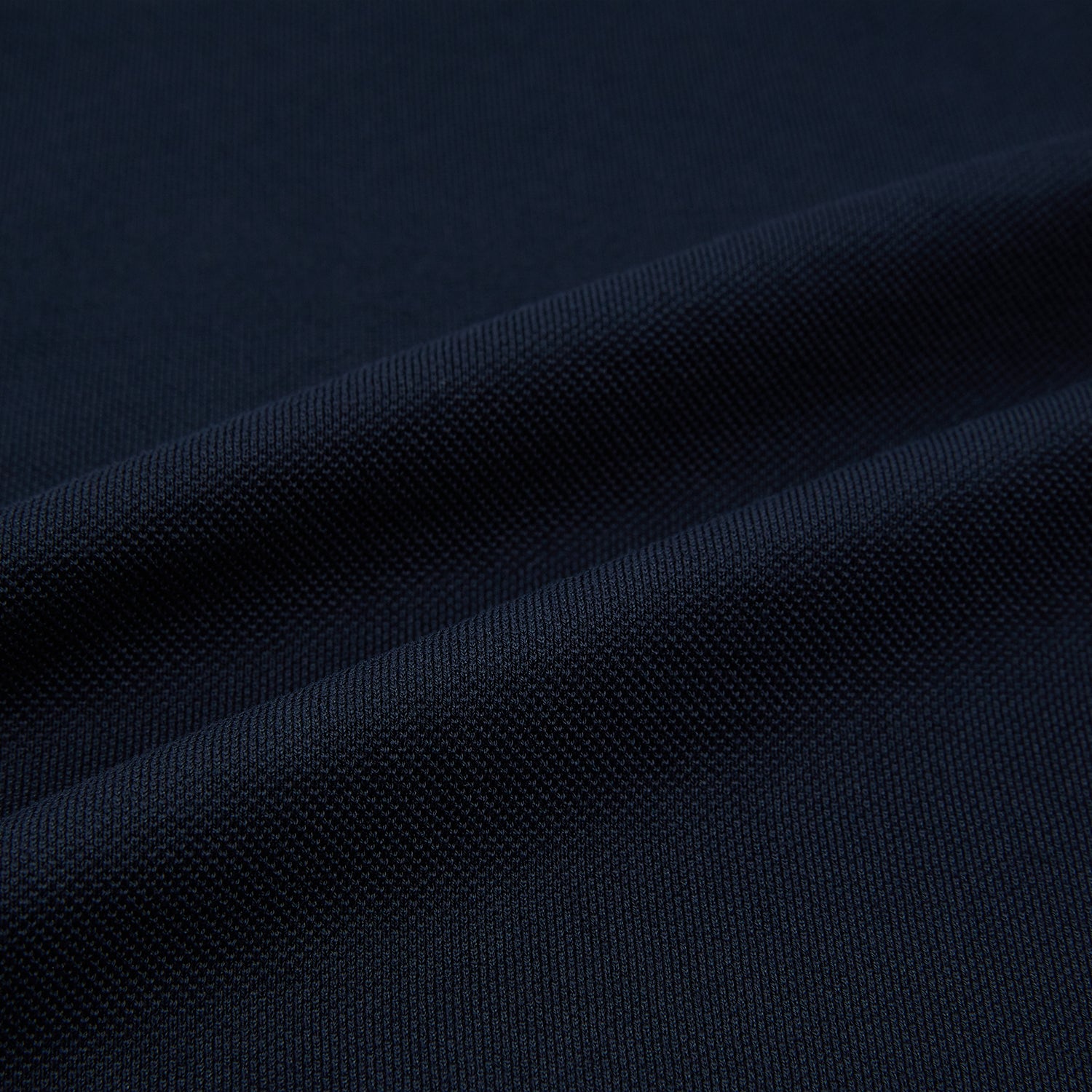 View 6 of product A Navy Rugby Polo Shirt by Turnbull & Asser, featuring long sleeves and a collar, is displayed flat on a white background. The design is simple and free of visible logos or patterns.