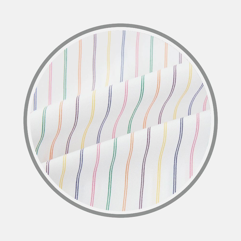 Close-up of Turnbull & Asser’s Rainbow Double Pinstripe Fabric, featuring wavy vertical stripes in orange, purple, green, yellow, and pink on white fabric, shown within a gray circular frame against a plain background.