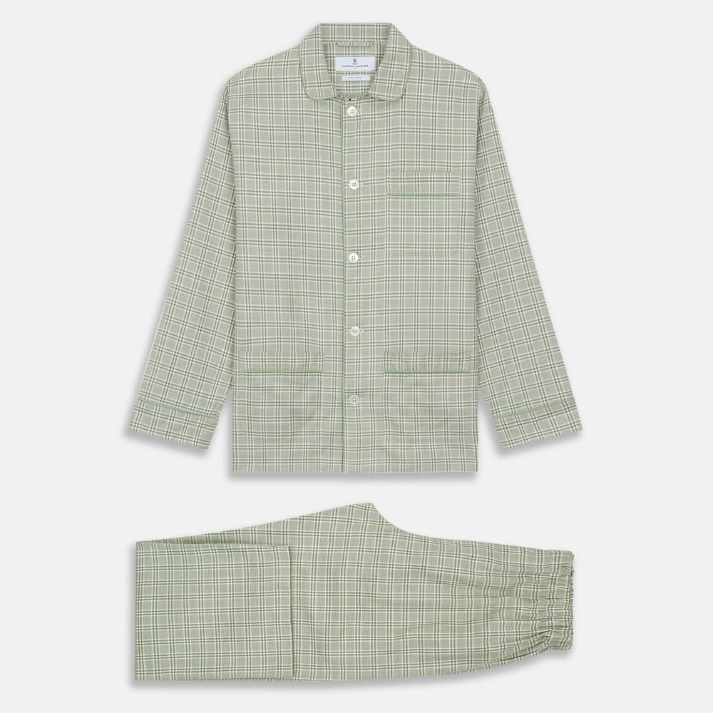 The Turnbull & Asser Green Check Modern Cotton Pyjama Set features a contemporary fit in white and green plaid, made from thicker cotton for added comfort.
