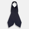 View 2 of product The White Dot and Navy Silk Cravat by Turnbull & Asser features evenly spaced white polka dots on navy silk—a classic accessory ideal for adding British elegance to any look.