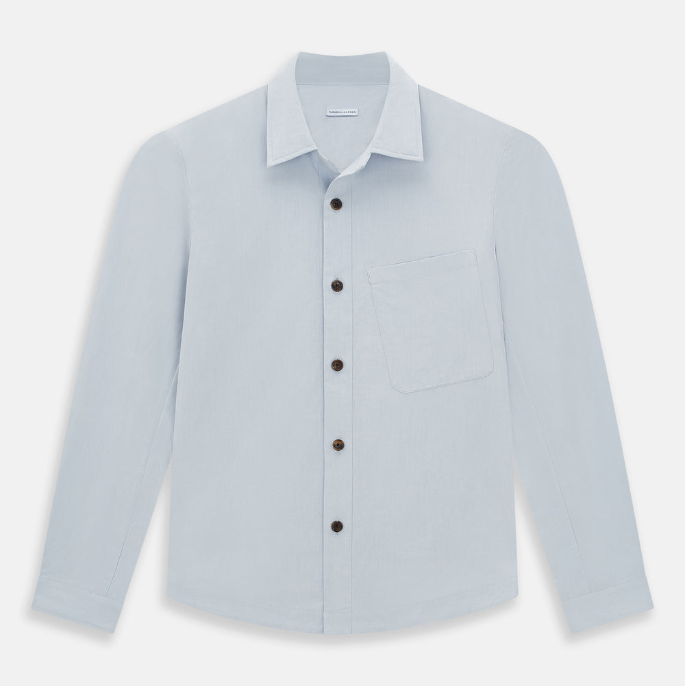 The Turnbull & Asser Grey Hyde Overshirt is a long-sleeve button-up made from sanforised cotton, featuring a single chest pocket and dark buttons, shown against a plain white background.