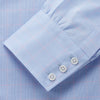 View 5 of product A Turnbull & Asser Blue and Pink Prince of Wales Check Mayfair Shirt with long sleeves, classic collar, buttoned front and cuffs, is neatly laid flat on a white background.