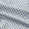 View 4 of product The Turnbull & Asser Green and Blue Check Cotton Hyde Pyjama Set for men features a long-sleeve, button-up top and pants with contrasting dark piping, shown laid flat on a white background.