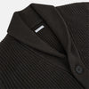 View 2 of product The Turnbull & Asser Dark Brown Cashmere Shawl Collar Cardigan features a ribbed knit, five black front buttons, and two front pockets, highlighting handcrafted quality against a white background.