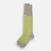 View 2 of product The Turnbull & Asser Lime/grey Thin Striped Long Socks are knee-high with green and yellow stripes and solid tan toe, heel, and cuff, shown against a plain light background.