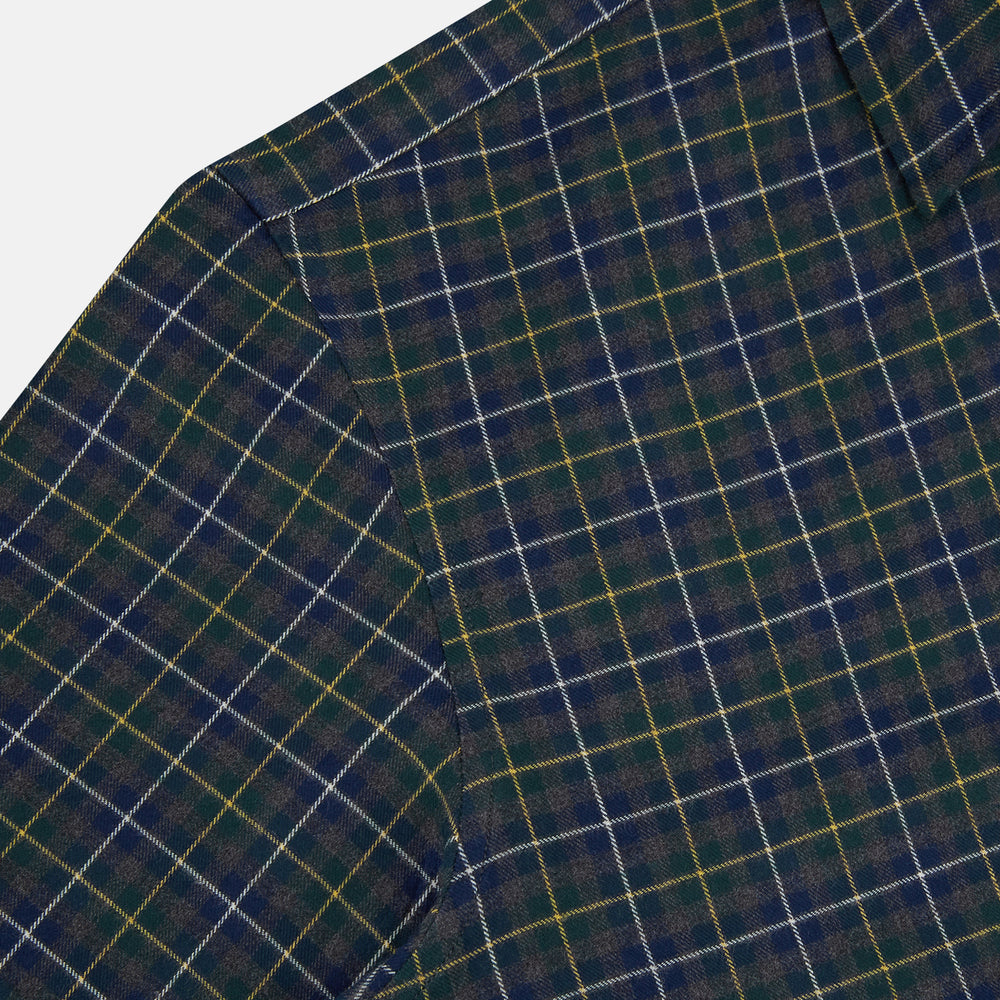 The Turnbull & Asser Navy and Khaki Tartan Windsor Shirt features a long-sleeve button-up design with a Windsor collar and buttoned cuffs, showcasing British craftsmanship in a classic tartan pattern.