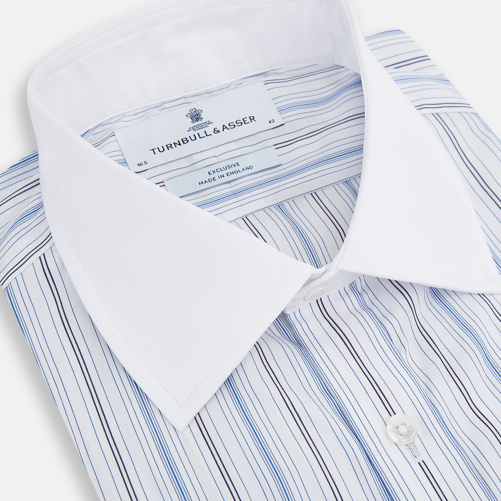 The Turnbull & Asser Navy and Blue Multi Stripe Shirt with Contrast Collar and Double Cuffs is shown in a Mayfair fit on a plain white background.