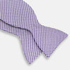 View 3 of product The Turnbull & Asser Purple and White Houndstooth Silk Bow Tie, ideal for formalwear, is shown against a white background.