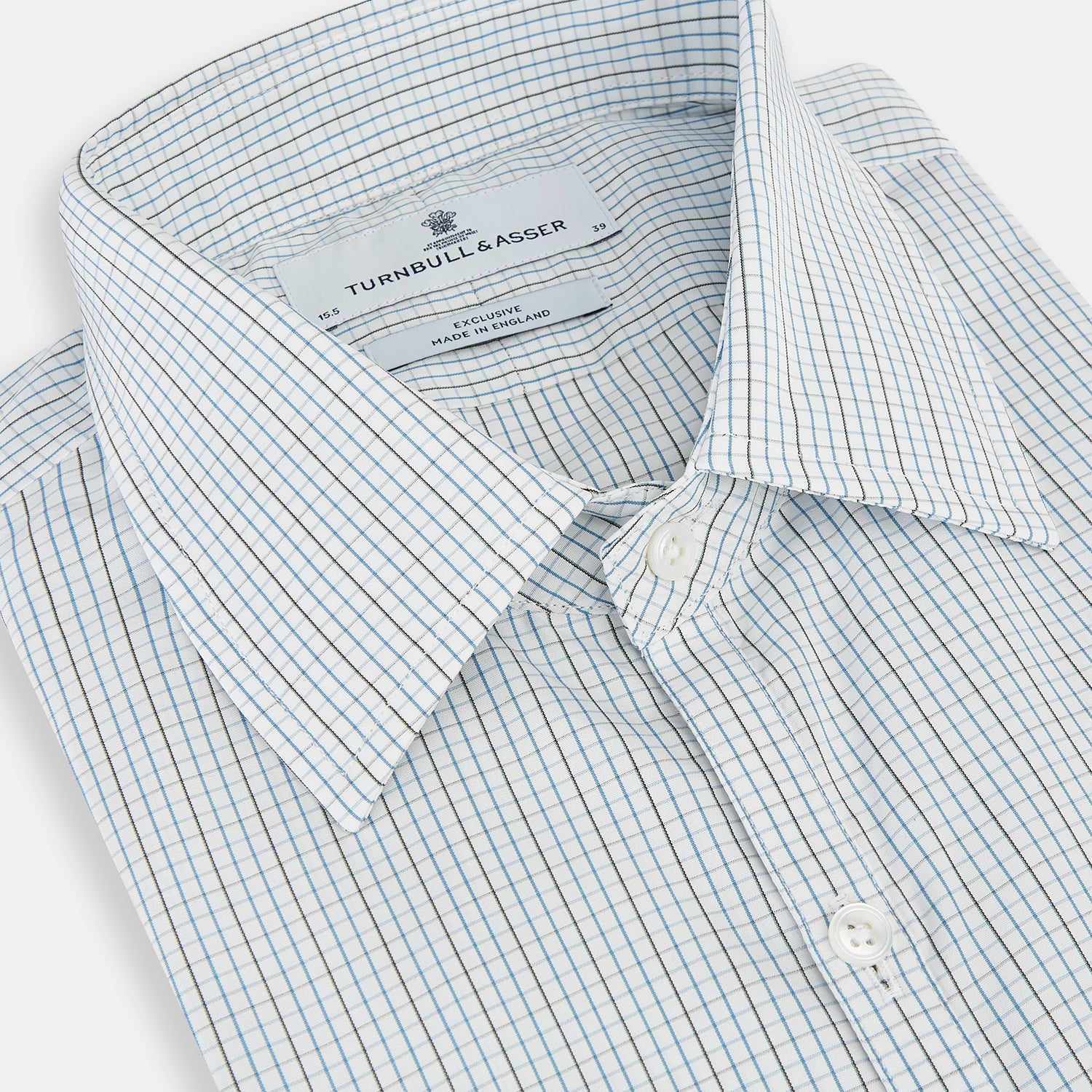 View 2 of product The Pale Blue and Navy Grid Check Westminster Shirt by Turnbull & Asser features a button-down front and pointed collar, highlighting fine British craftsmanship, displayed on a white background.