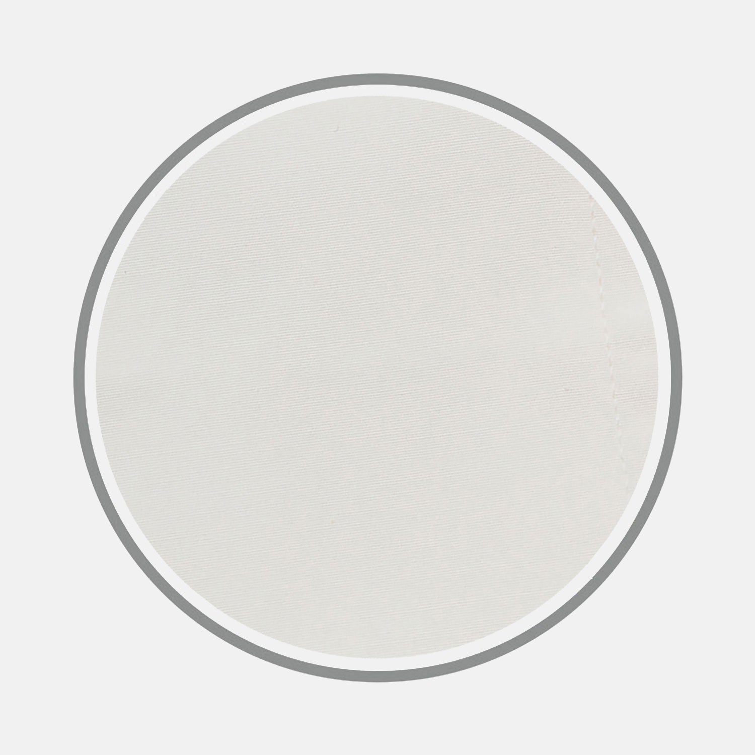 View 1 of product A close-up of Turnbull & Asser's Cream Cotton Fabric, framed by a circular gray border. The smooth cotton shows a subtle seam on the right, highlighting the product's fine texture and quality.