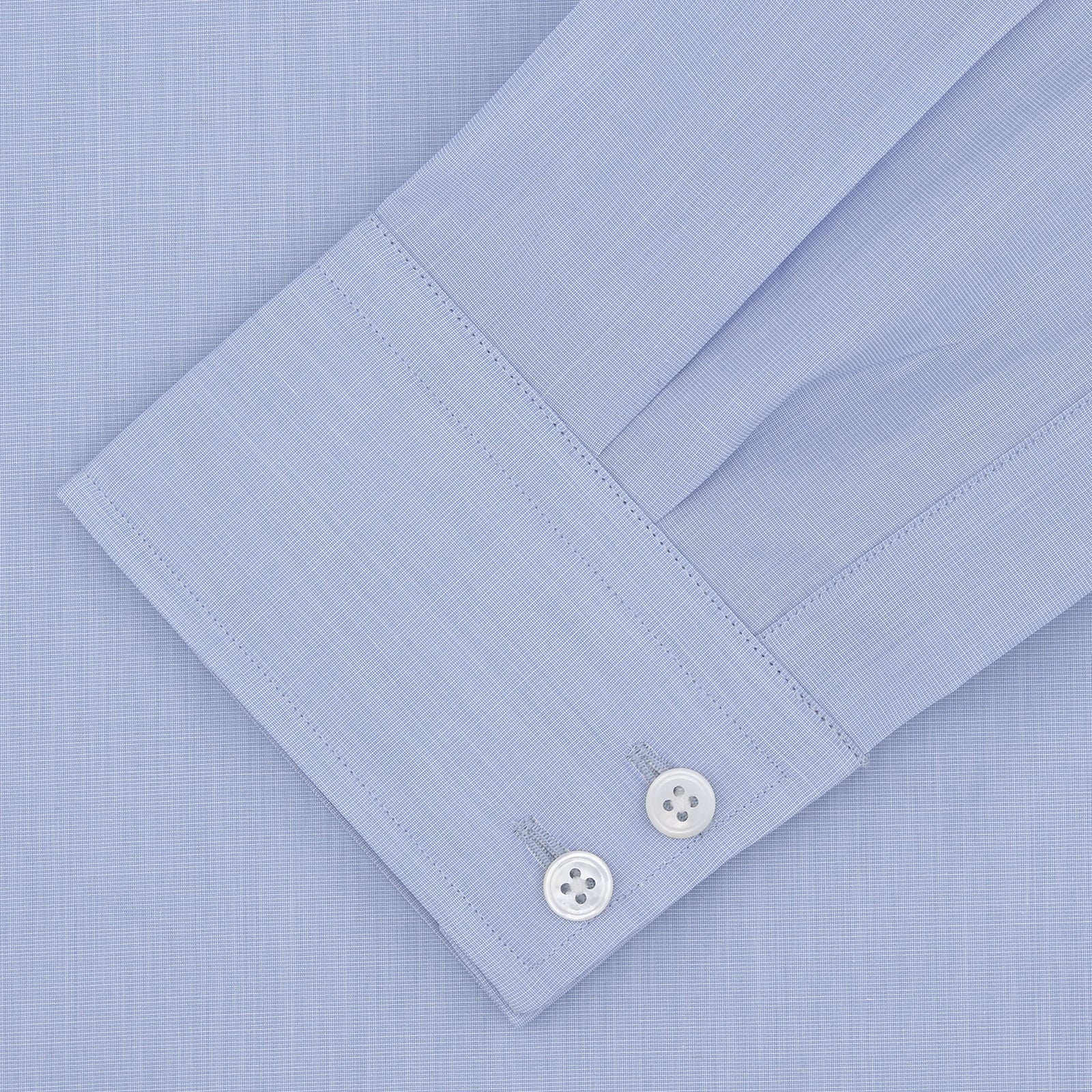 View 2 of product A Turnbull & Asser Tailored Fit Light Blue End-on-End Shirt with a Kent collar and 2-button cuffs is shown neatly folded on a plain white background. The shirt features classic styling and the Turnbull & Asser label.