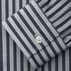 View 3 of product The Turnbull & Asser Navy Multi Stripe Weekend Fit Wool Shirt features a Derby collar, 1 button cuffs, and bold multicolored stripes, shown laid flat on a plain background.